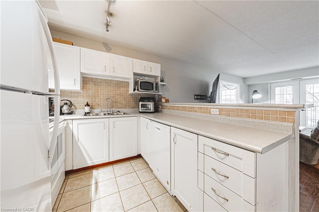 313-1451 Walkers Line Property Photo 6