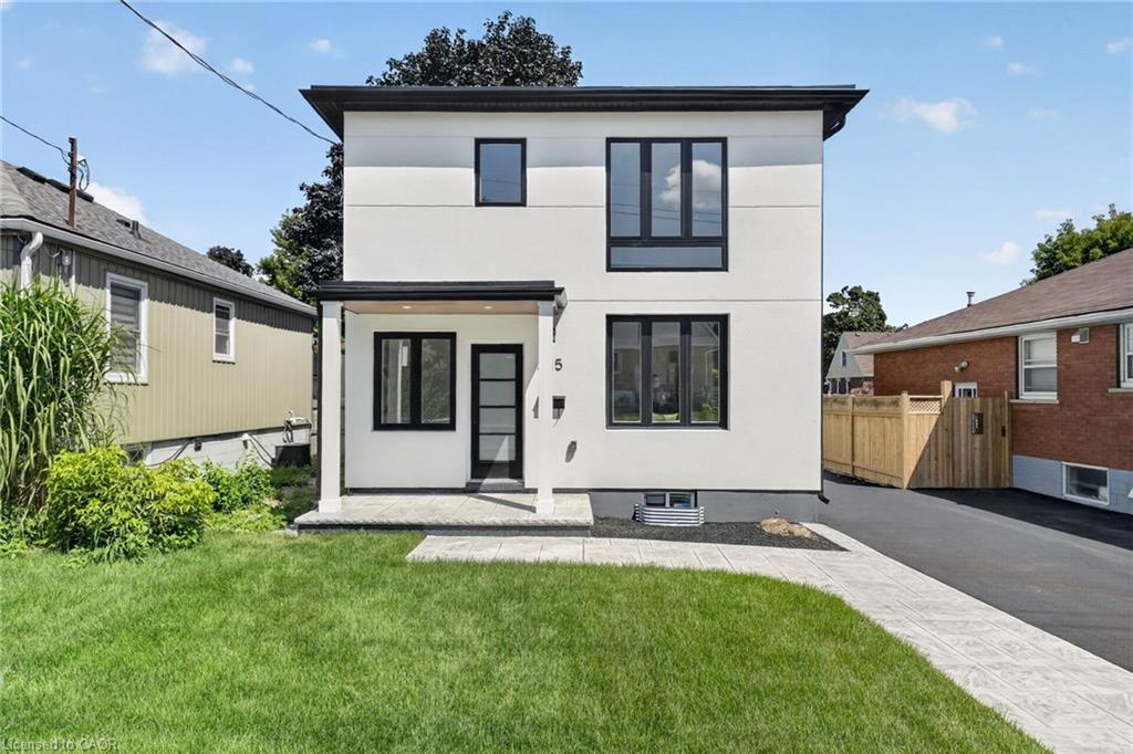 325 Queensdale Avenue E Property Photo 1