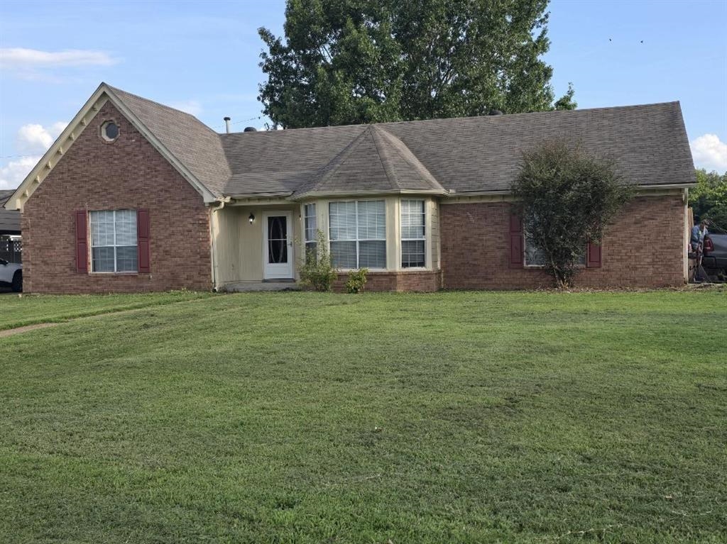 7155 COFFEEVILLE CV Property Photo 1