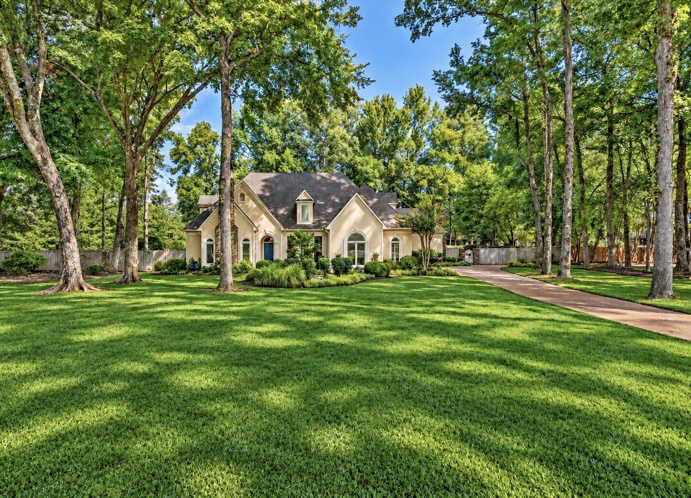 9730 WOODLAND RUN LN Property Photo 1