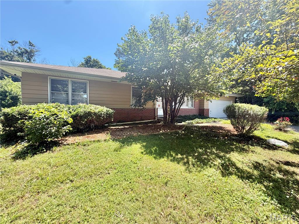 7012 N Hanley Road Property Photo 1