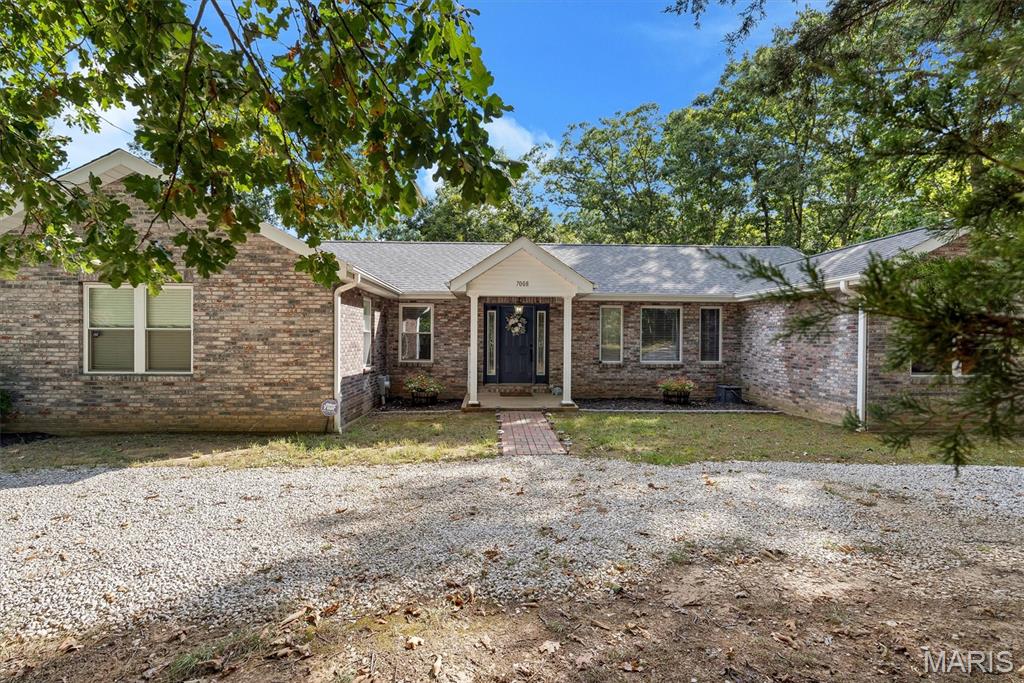 7008 Fawn Woods Drive Property Photo 1