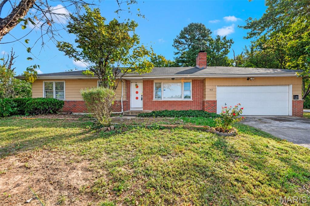 7012 N Hanley Road Property Photo 1