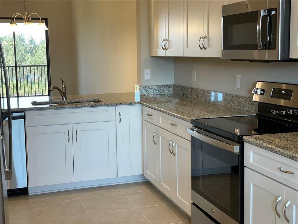 13823 Messina Loop #203 Property Photo 4