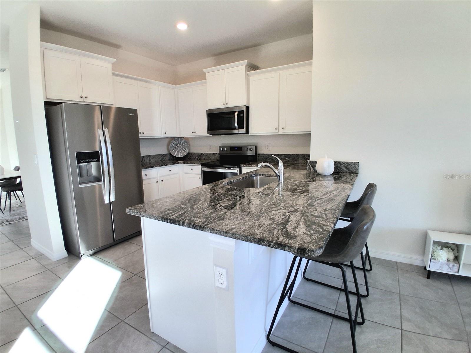 8072 Penrose Pl Property Photo 5
