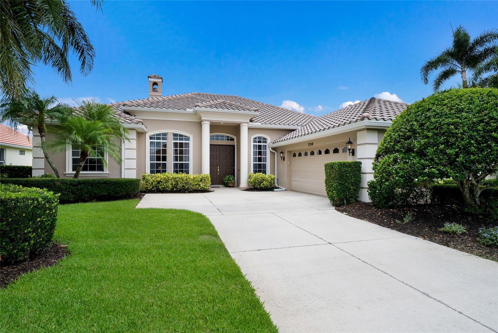 7058 TWIN HILLS TER Property Photo 1
