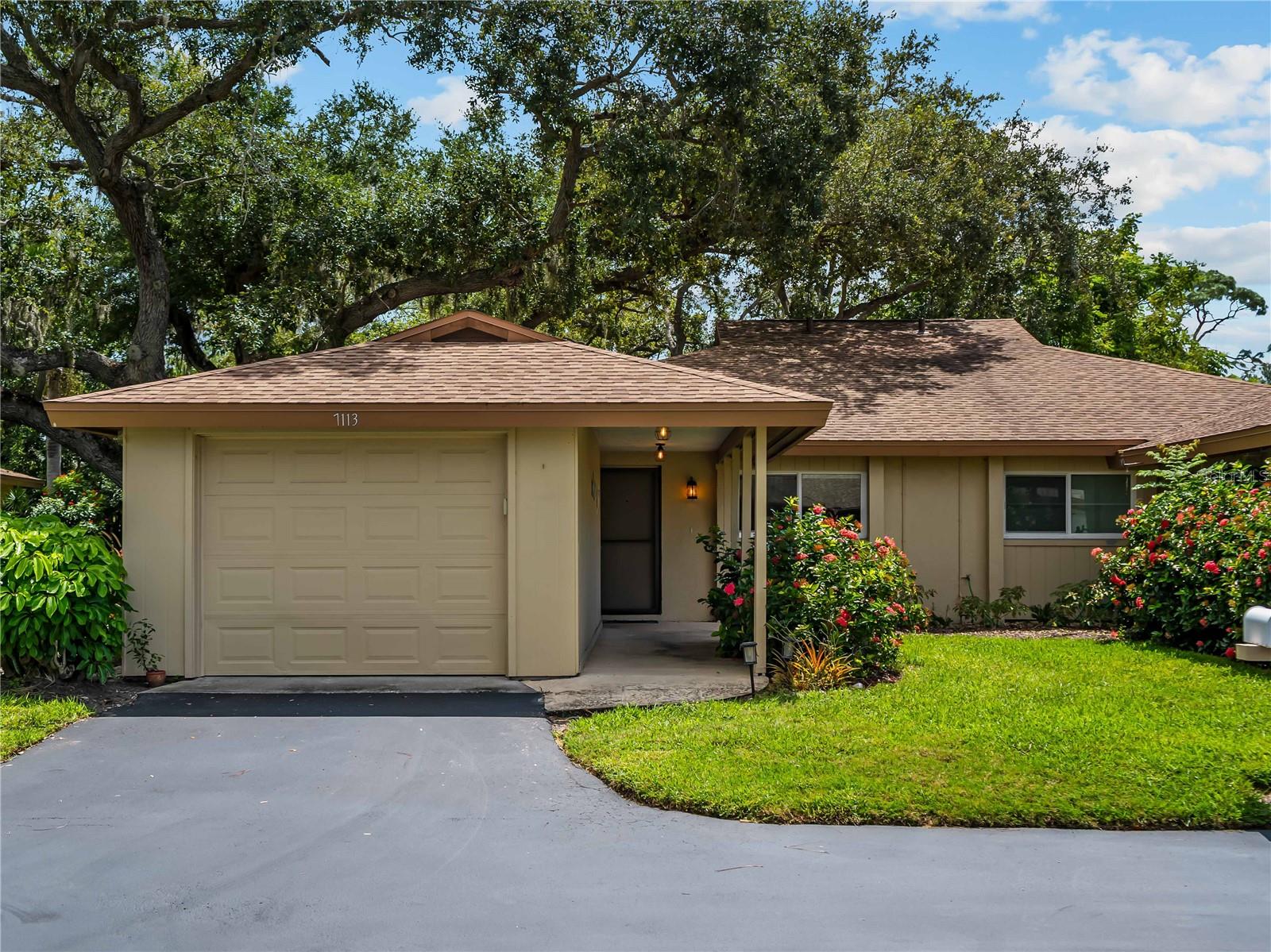 7113 BRIGHT CREEK DR #100 Property Photo 1