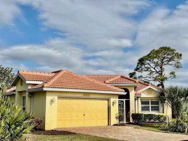 3893 CAPE COLE BLVD Property Photo 1
