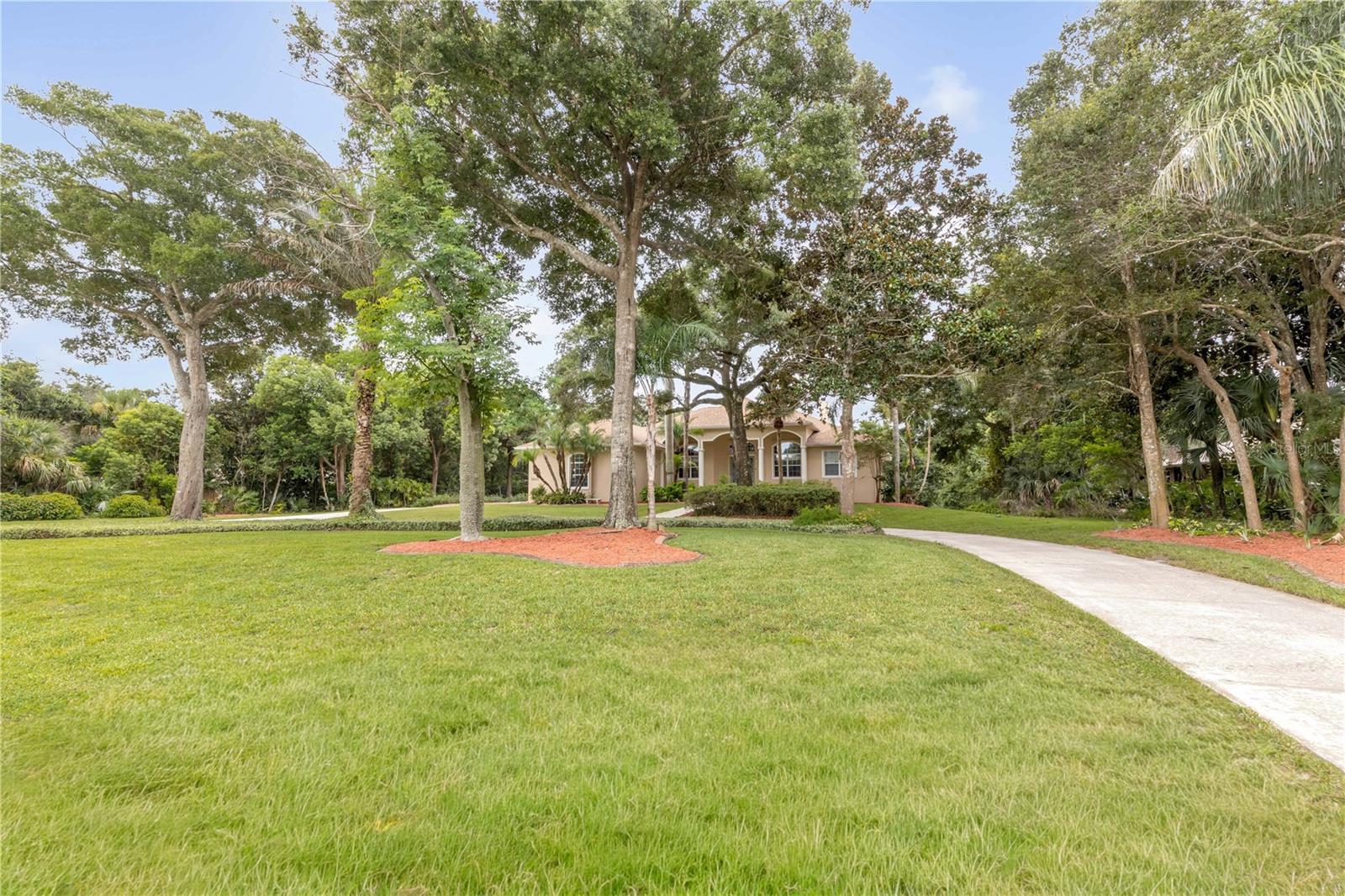 5842 Spruce Creek Woods Dr Property Photo 2
