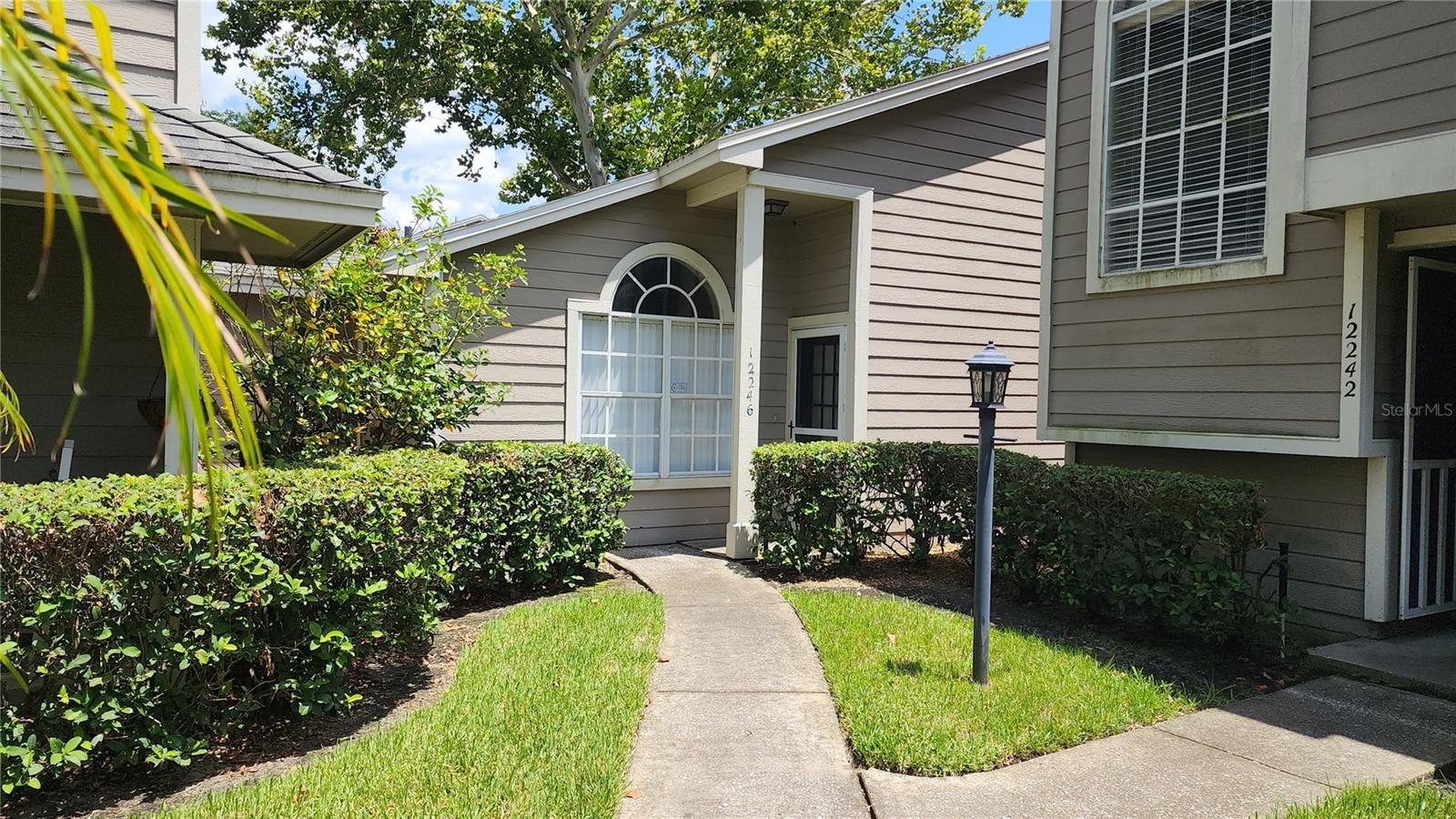 12246 SHADY SPRING WAY #102 Property Photo 1