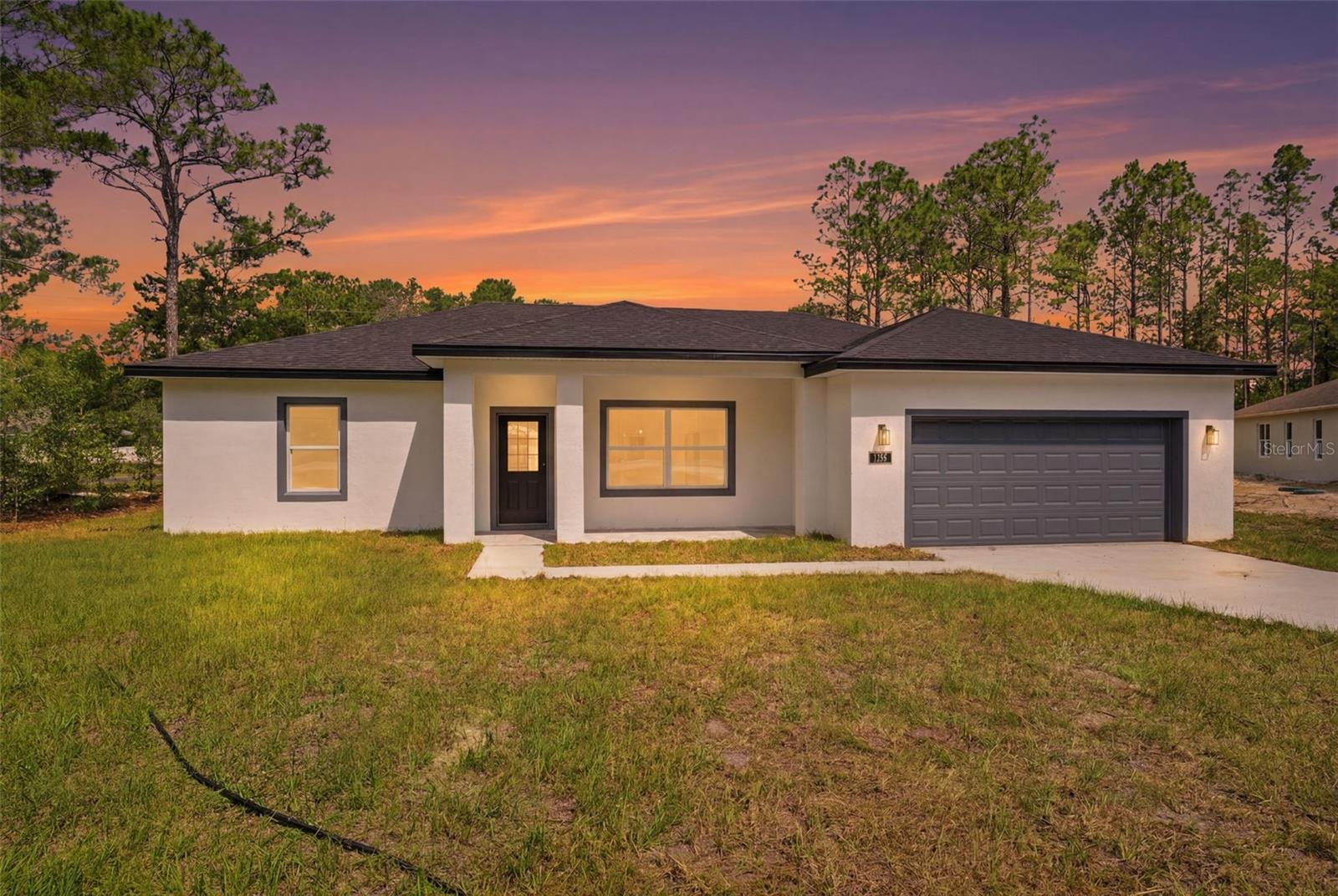 7712 N Tide Pt Property Photo 1