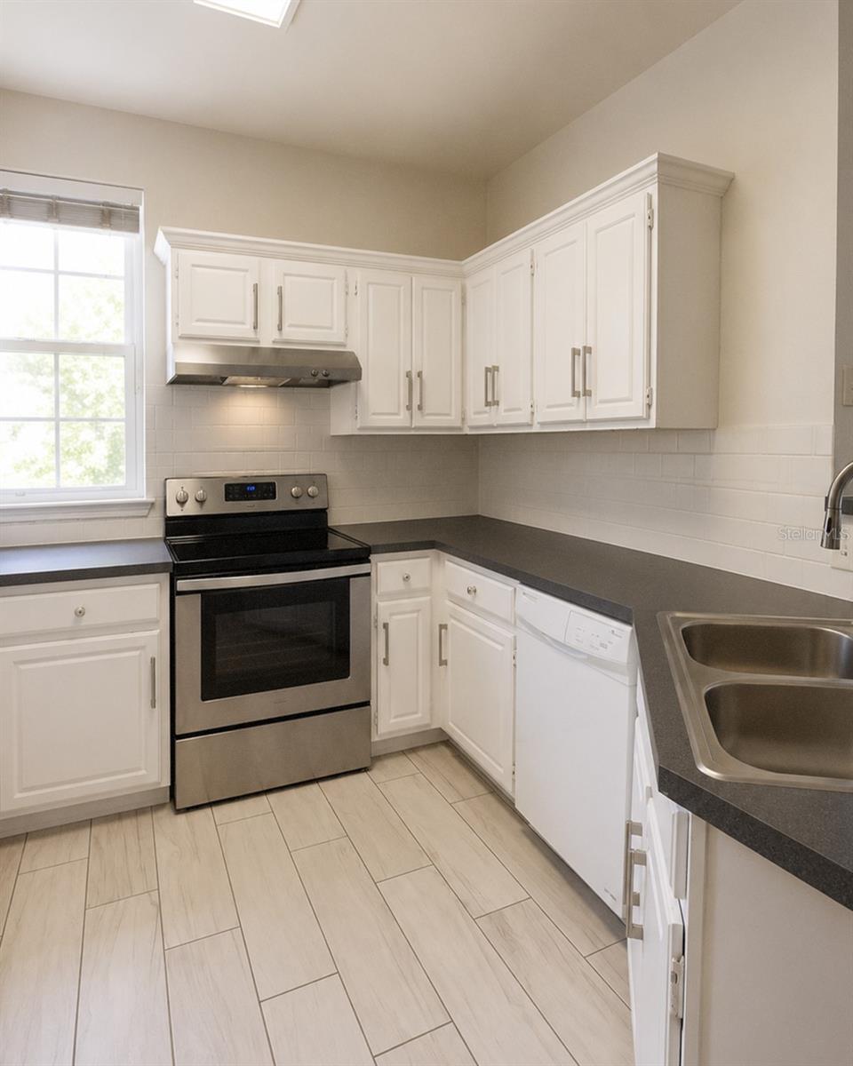 3213 Greenwich Village Blvd #102 Property Photo 5