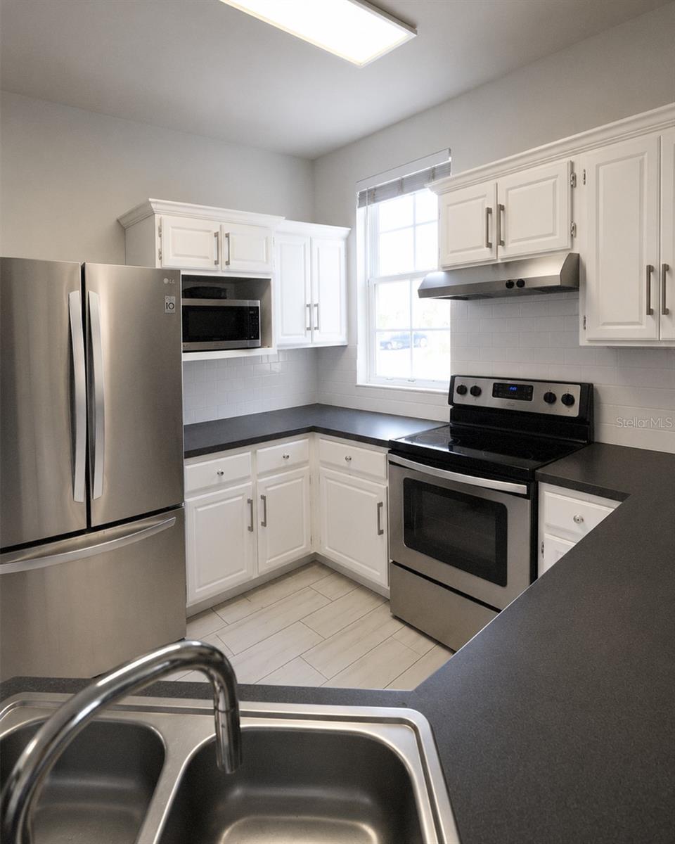 3213 Greenwich Village Blvd #102 Property Photo 6