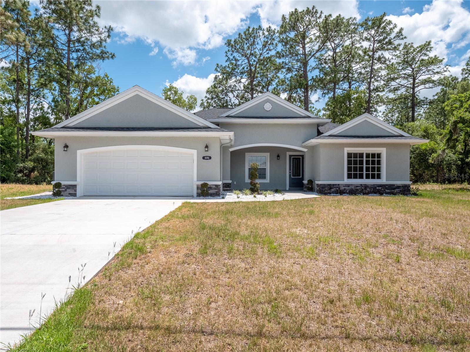 696 Marion Oaks Trl Property Photo 1
