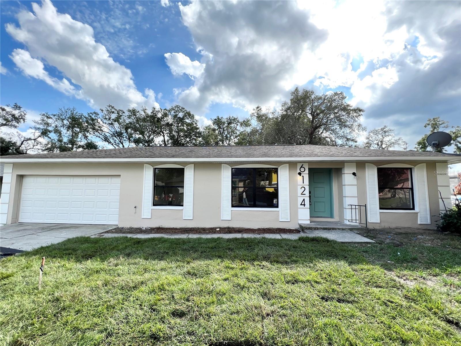 6124 RHYTHM BLVD Property Photo 1