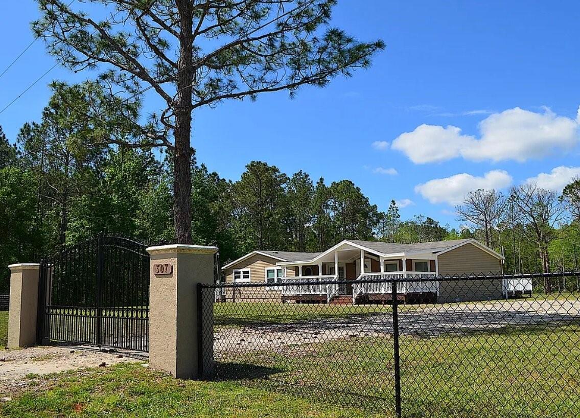 307 Country World Dr W Property Photo 1