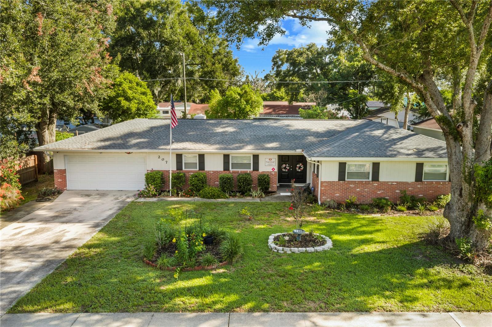 207 W WHEELER RD