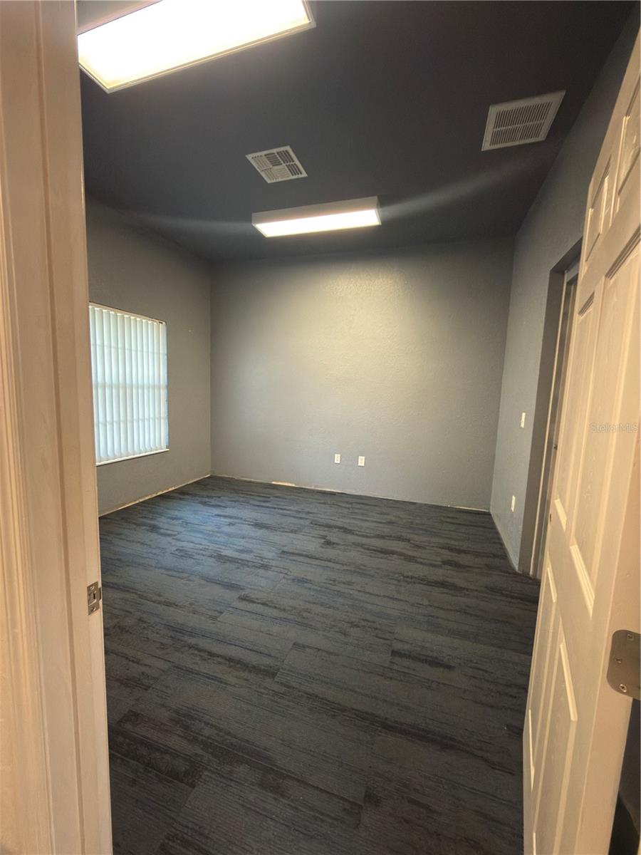 233 NE 58TH AVE #J Property Photo 1