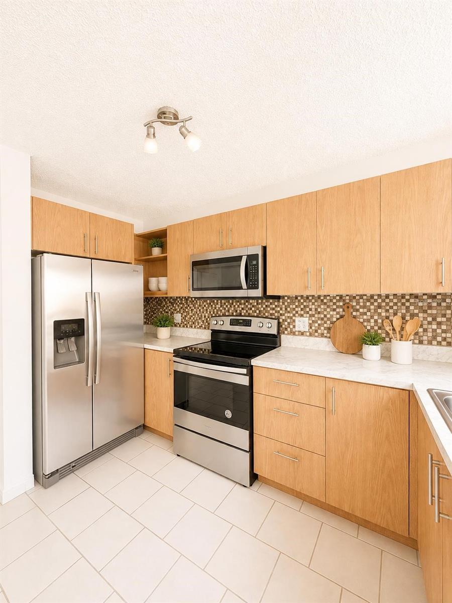 ALTURAS DE PIEDRAS BLANCA UNIT D #202 Property Photo 1