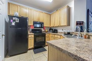 10205 Courtney Palms Blvd #304 Property Photo 5