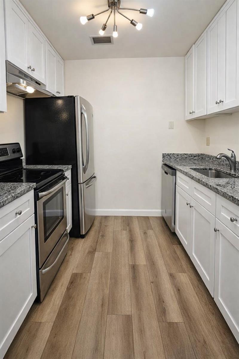 1712 Belleair Forest Dr #a Property Photo 3