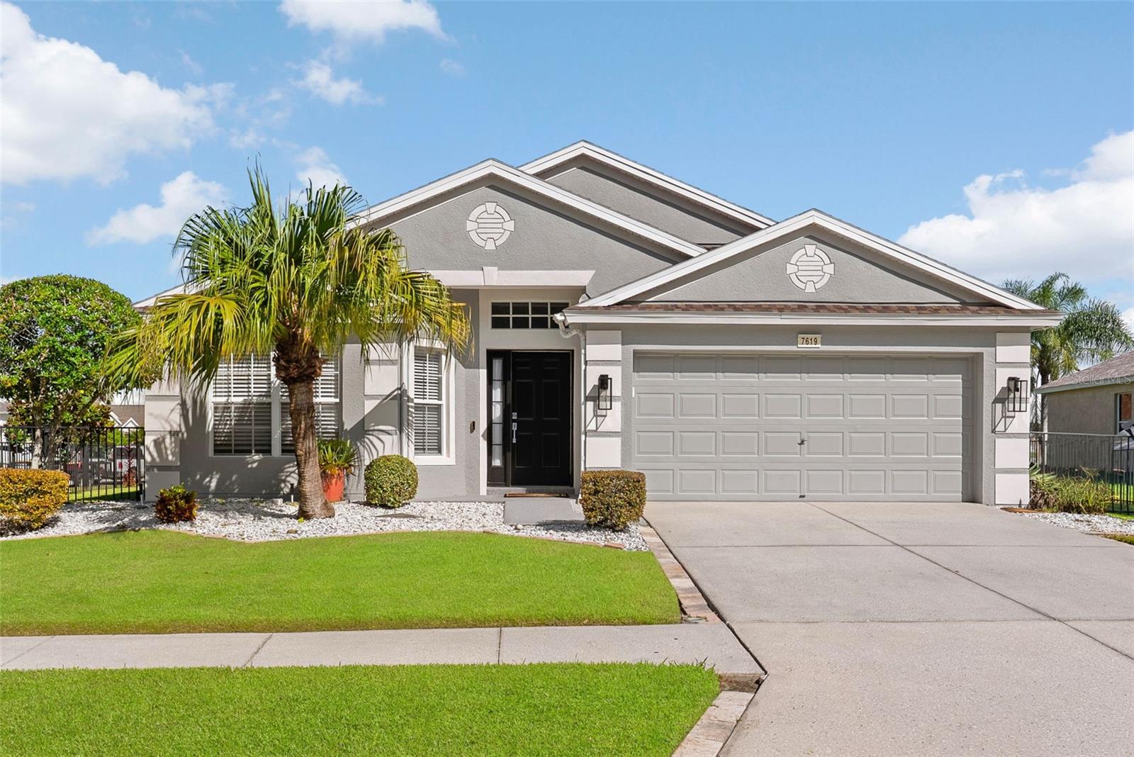 7619 CRESCENT PALM DR Property Photo 1
