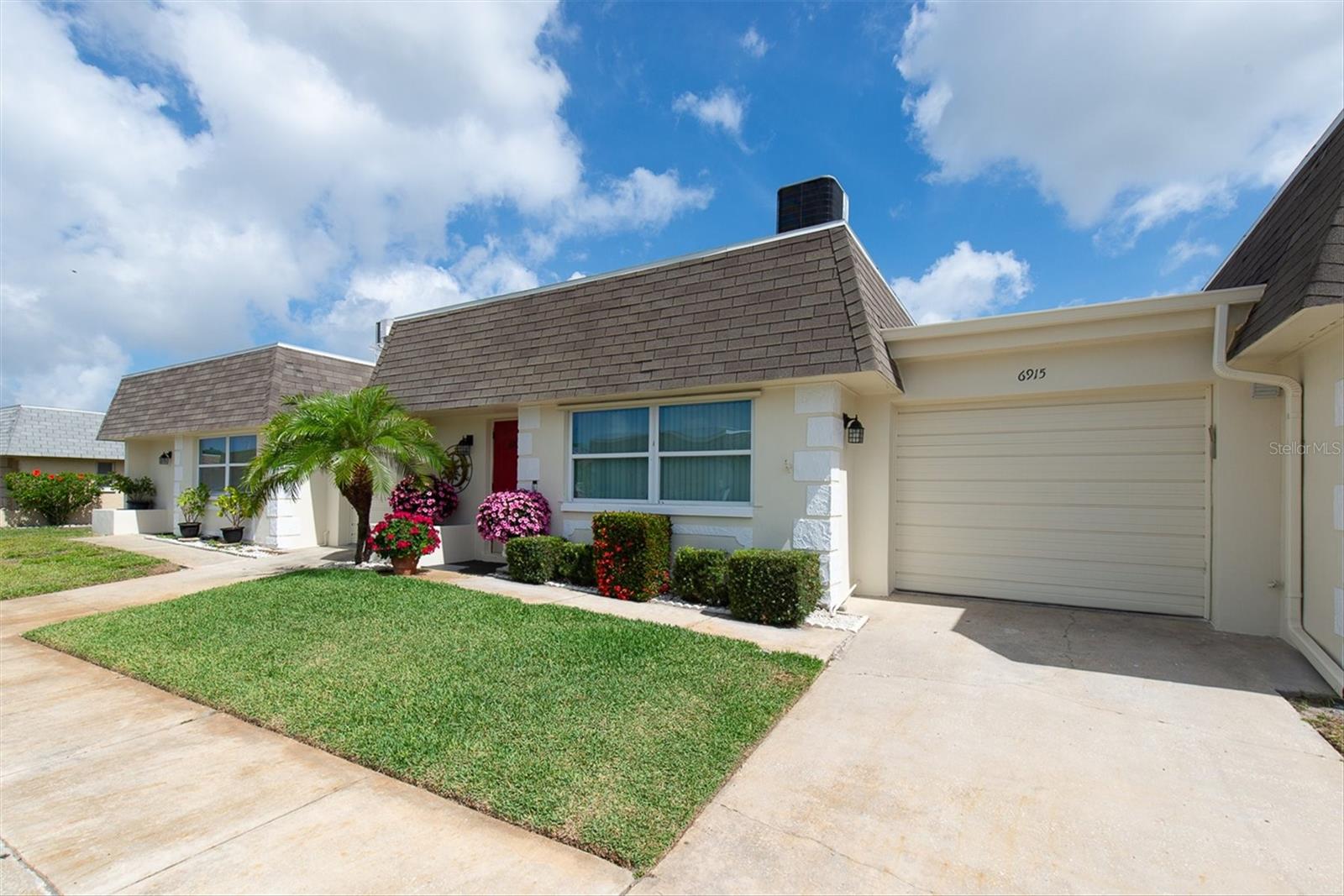 6915 Versailles N Property Photo 1