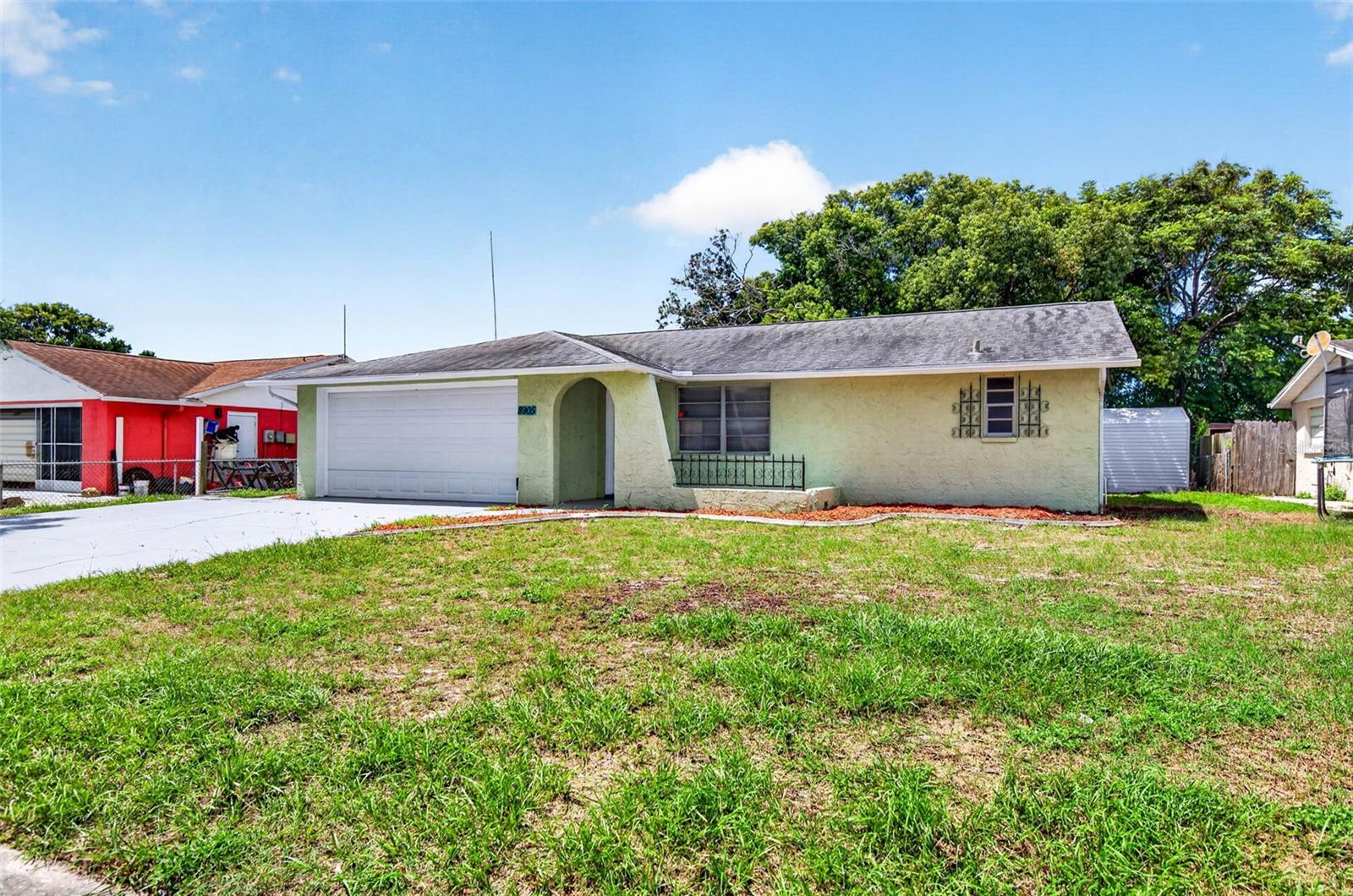 8905 TROPICAL PALM WAY Property Photo 1