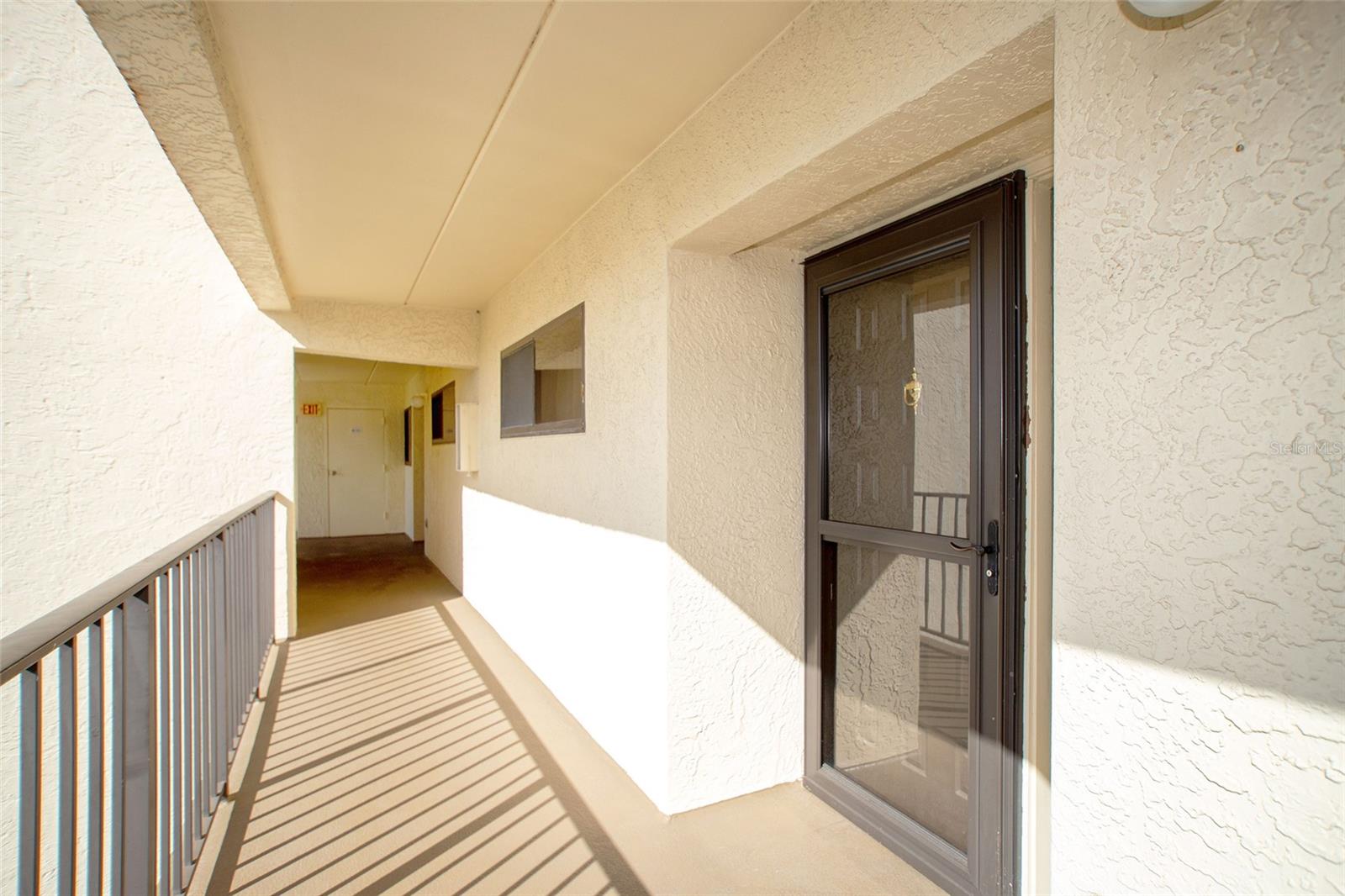 9490 HARBOR GREENS WAY #306 Property Photo 1