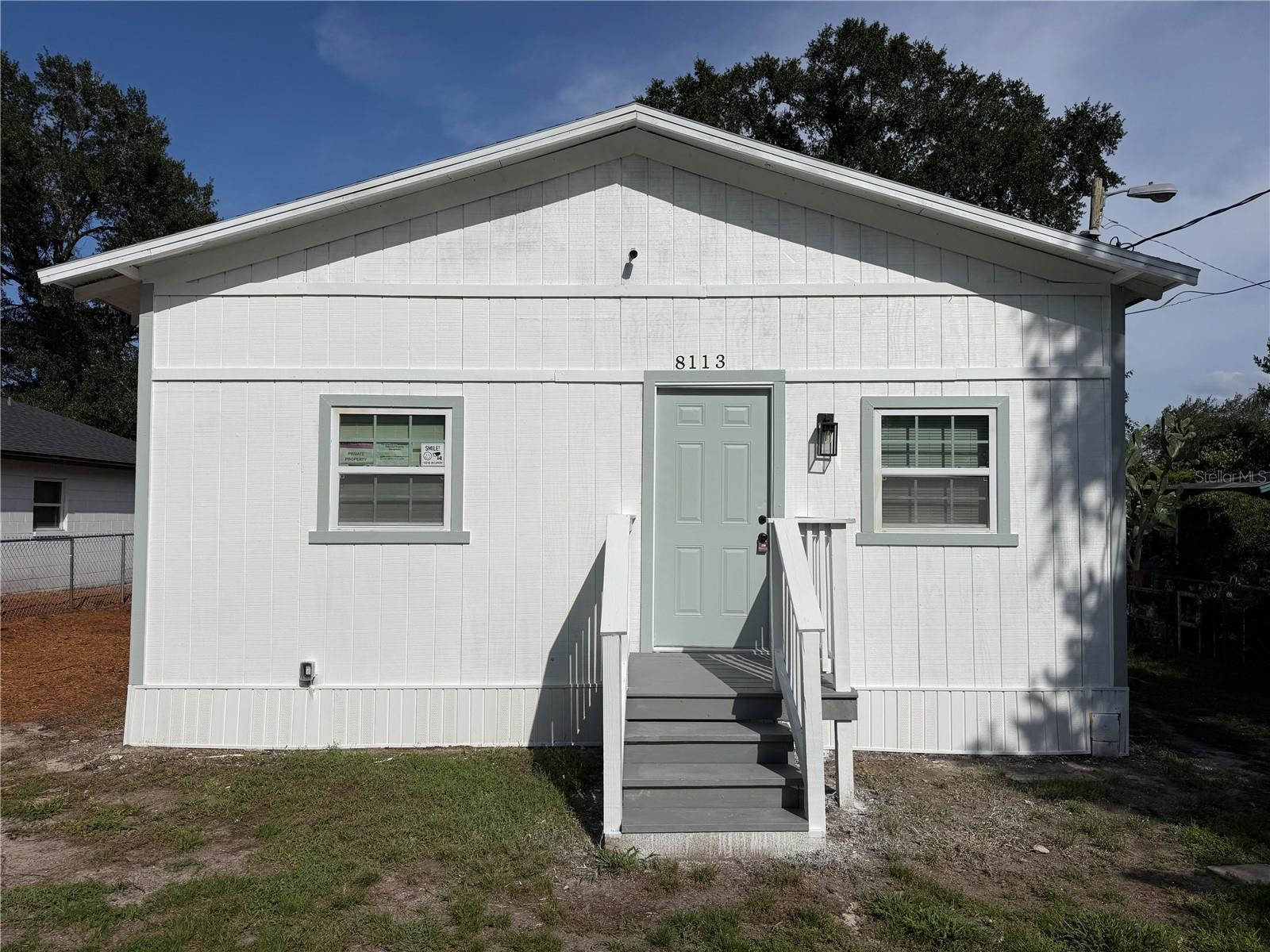 8113 N SEMMES ST Property Photo 1