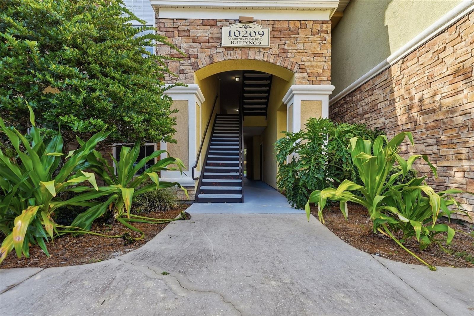 10209 COURTNEY PALMS BLVD #301 Property Photo 1