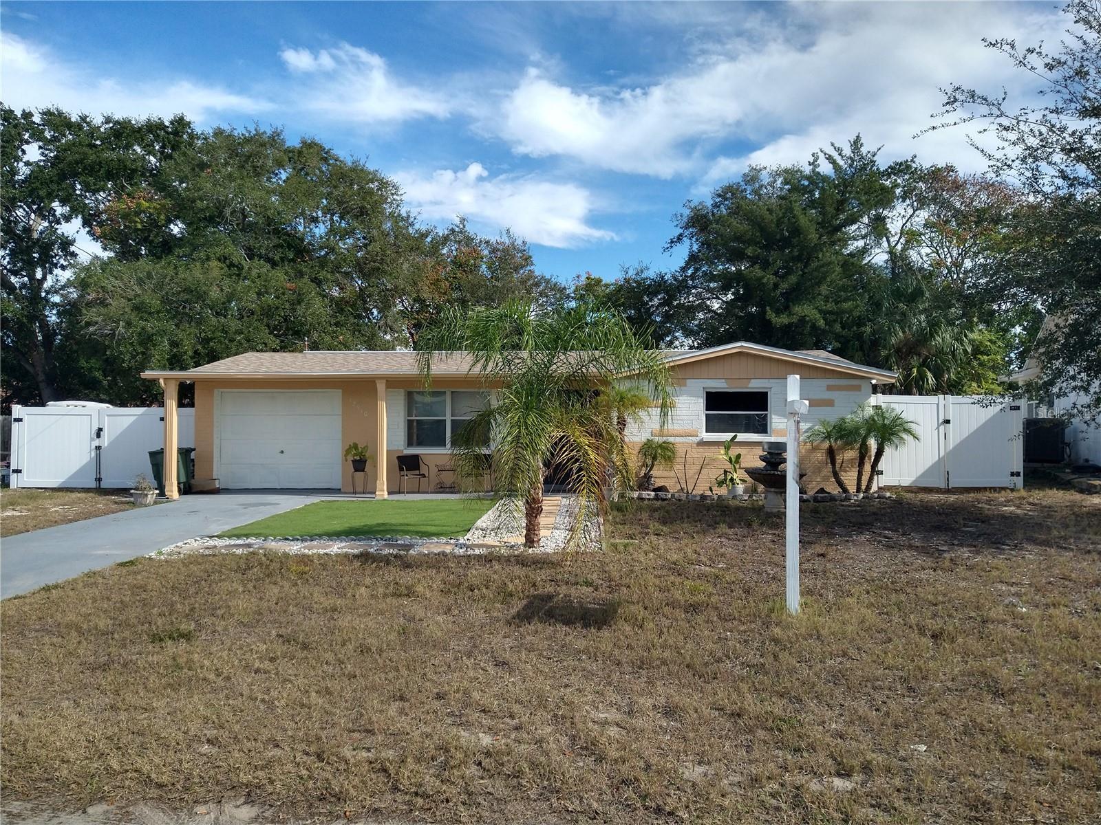 12910 COLLEGE HILL DR Property Photo 1