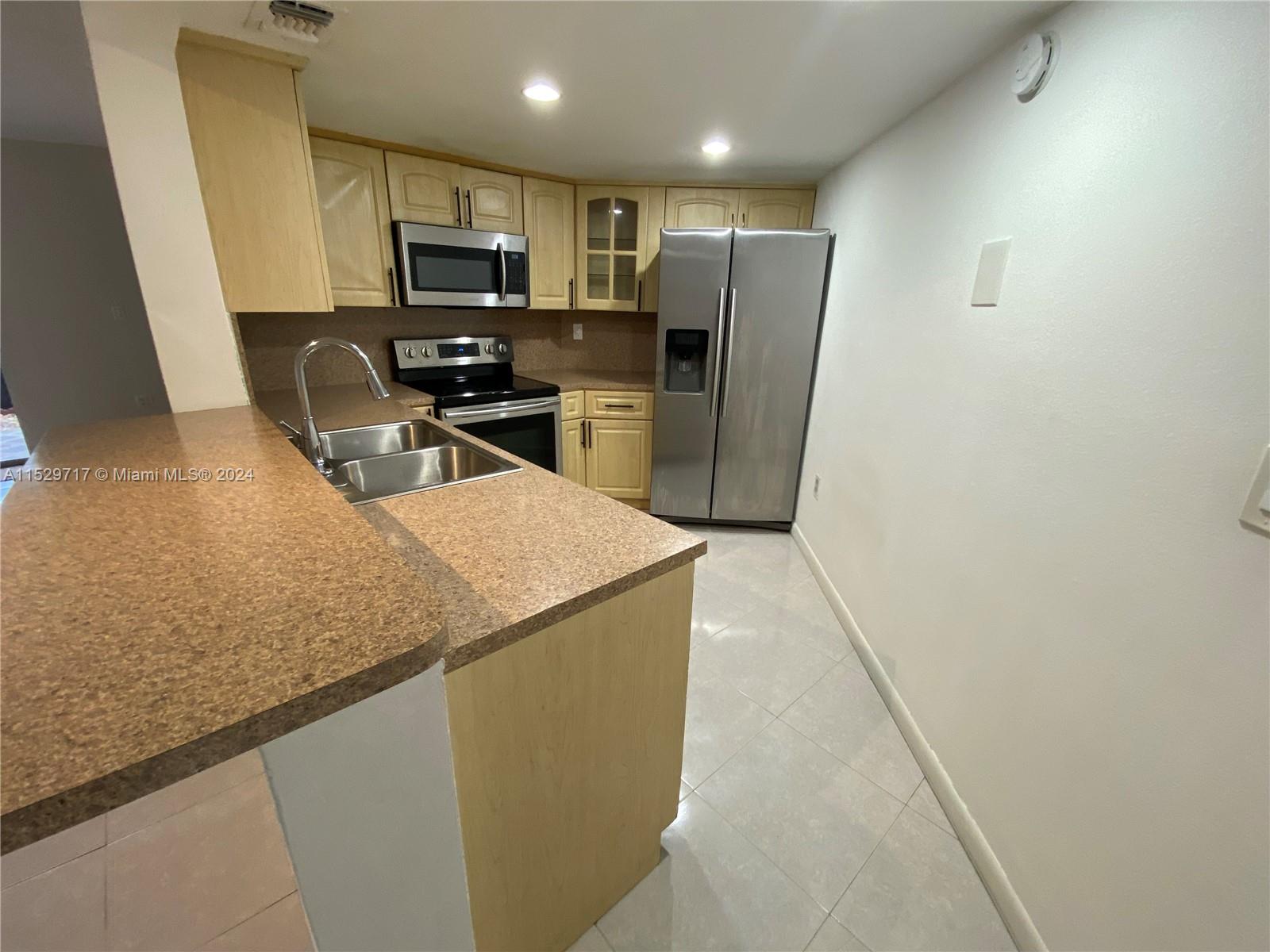 9735 Fontainebleau Blvd G102 Property Photo 4