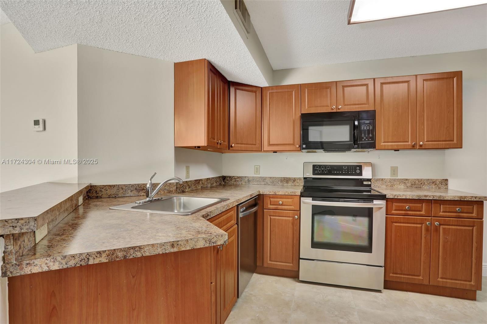8891 Wiles Rd 102 Property Photo 4