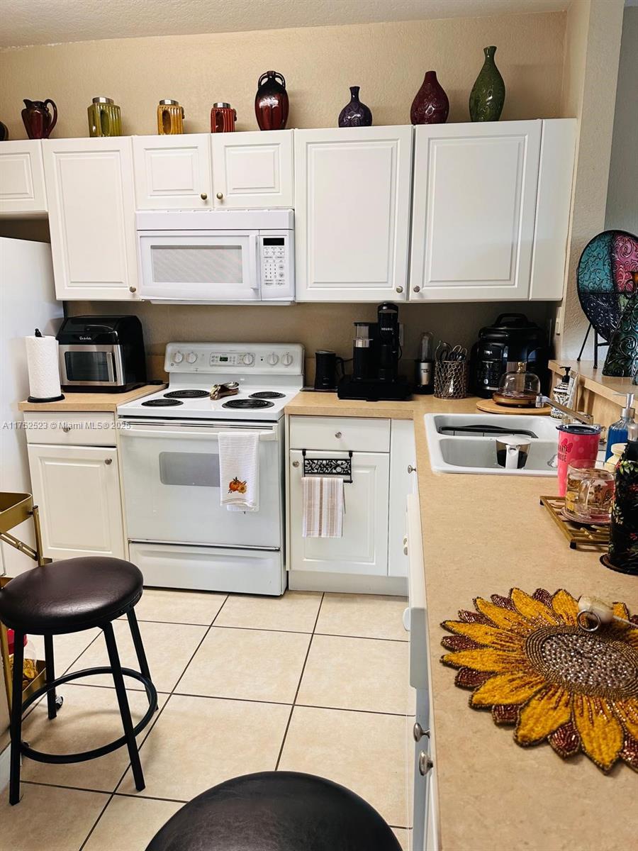 1550 Ne 33rd Ave 107-8 Property Photo 6