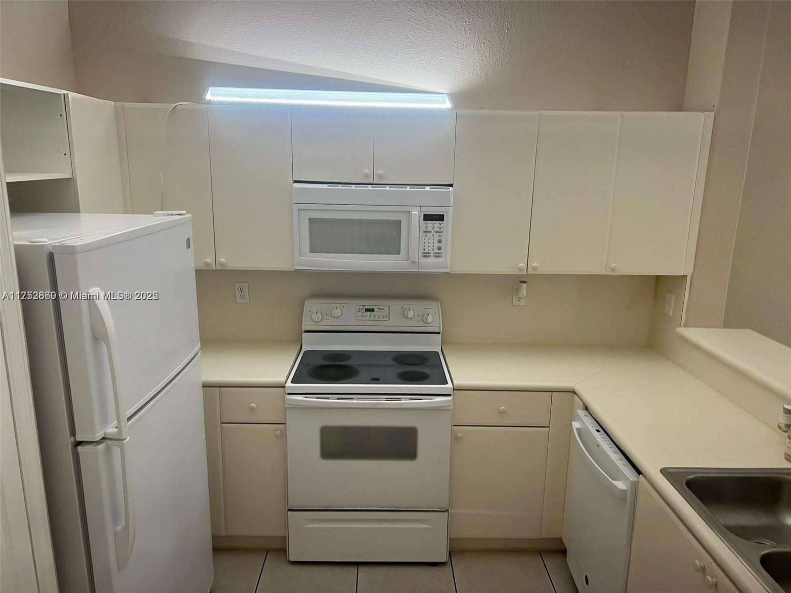 1666 Se 27th Ct 208 Property Photo 1
