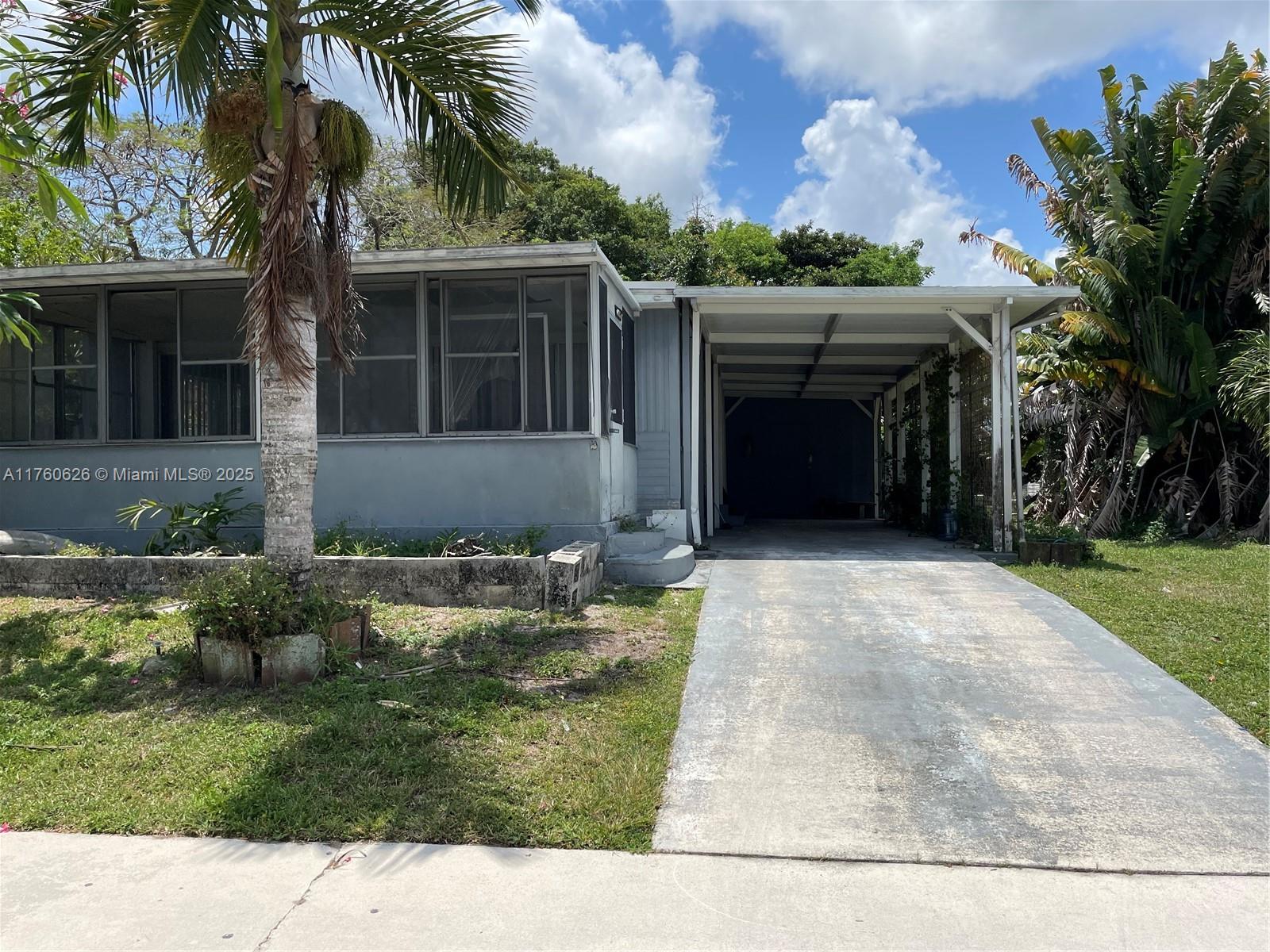 6590 Sandalfoot Blvd H Property Photo