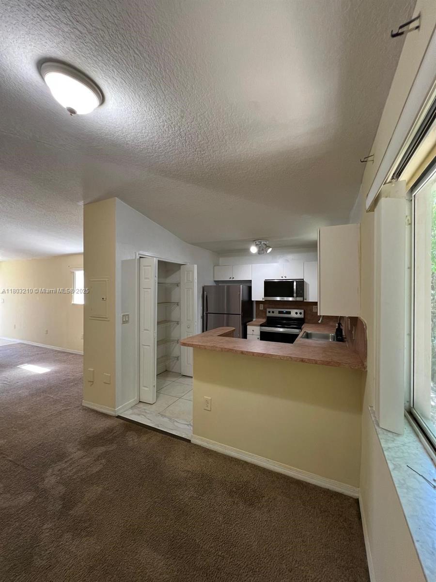 1260 Se 31st Ct 201-34 Property Photo 1
