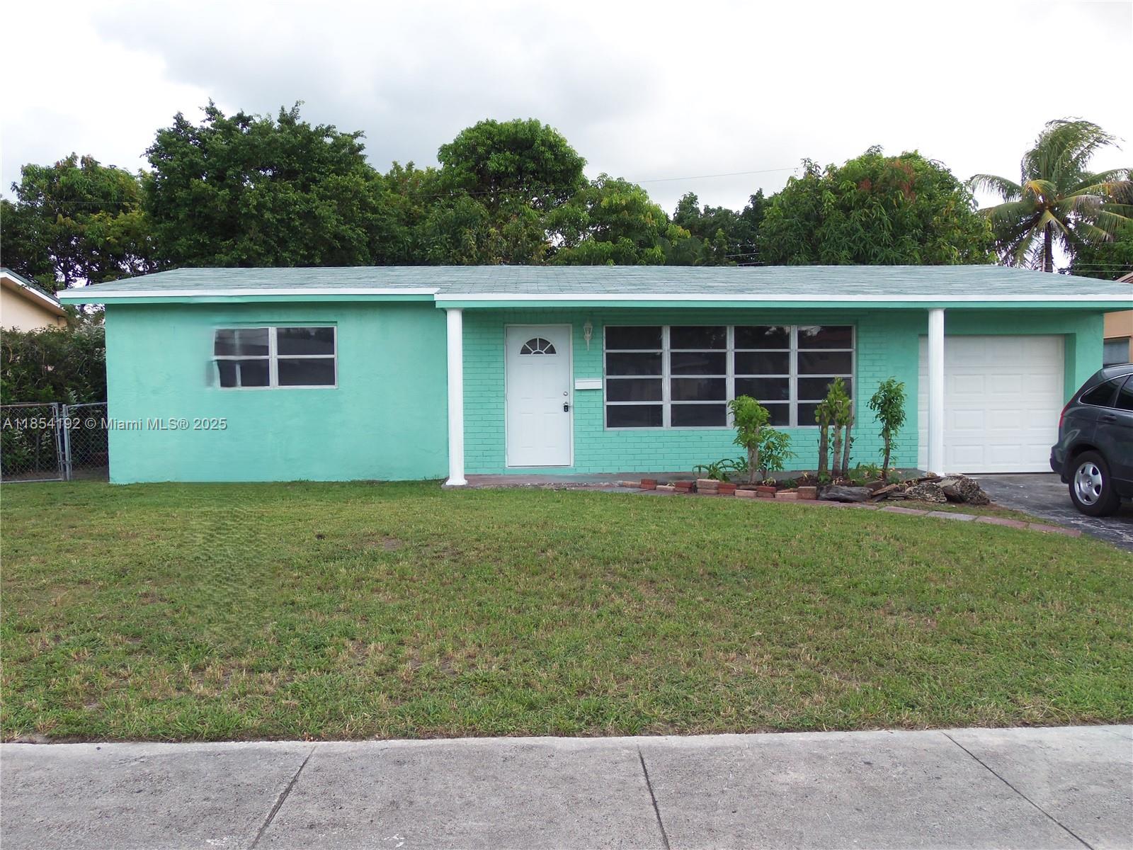 5960 NW 16th Ct Property Photo 1