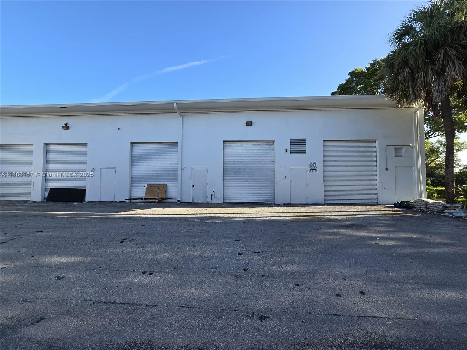 11917 W Sample Rd 11919 Property Photo 1