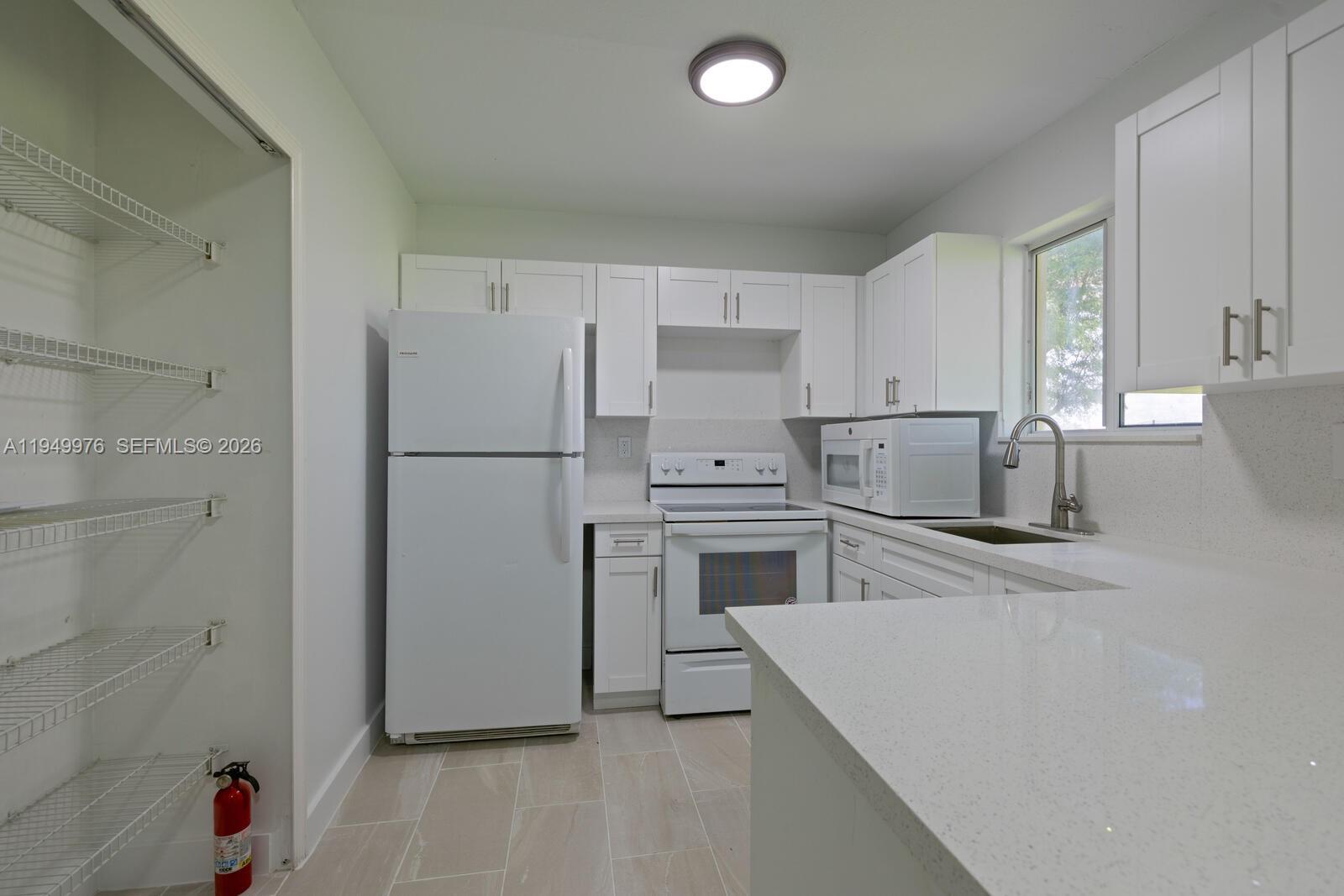 990 Ne 33rd Ter 201 Property Photo 6