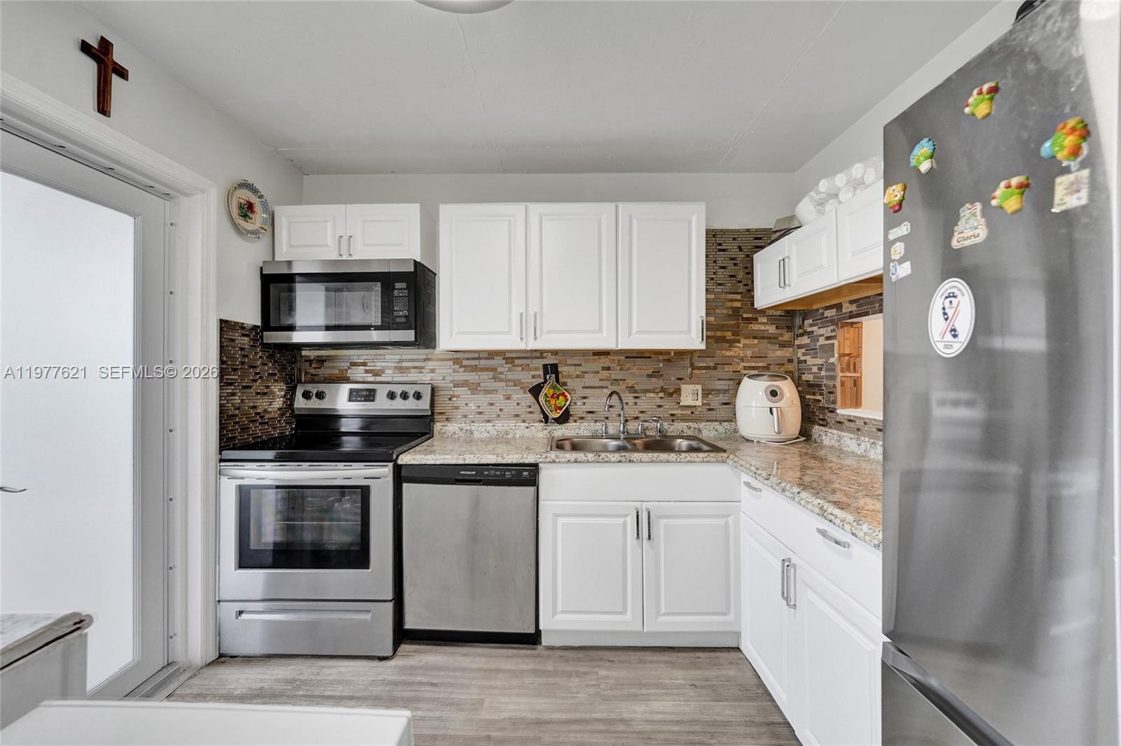 4650 Washington St 209 Property Photo 1
