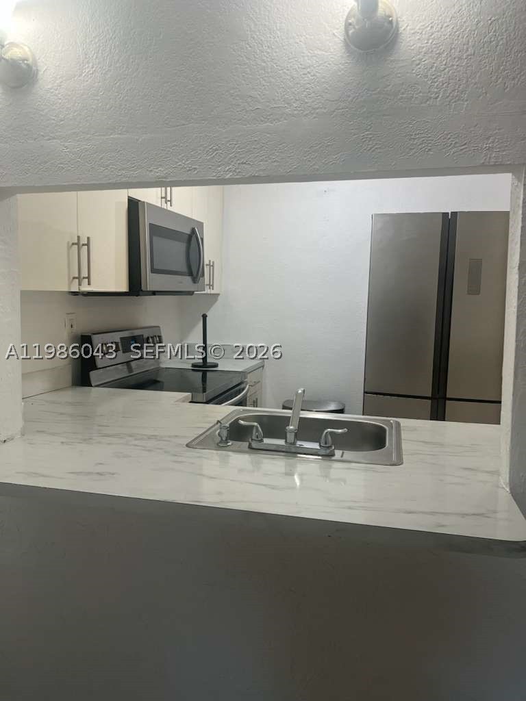4550 Nw 9th St 114e Property Photo 1