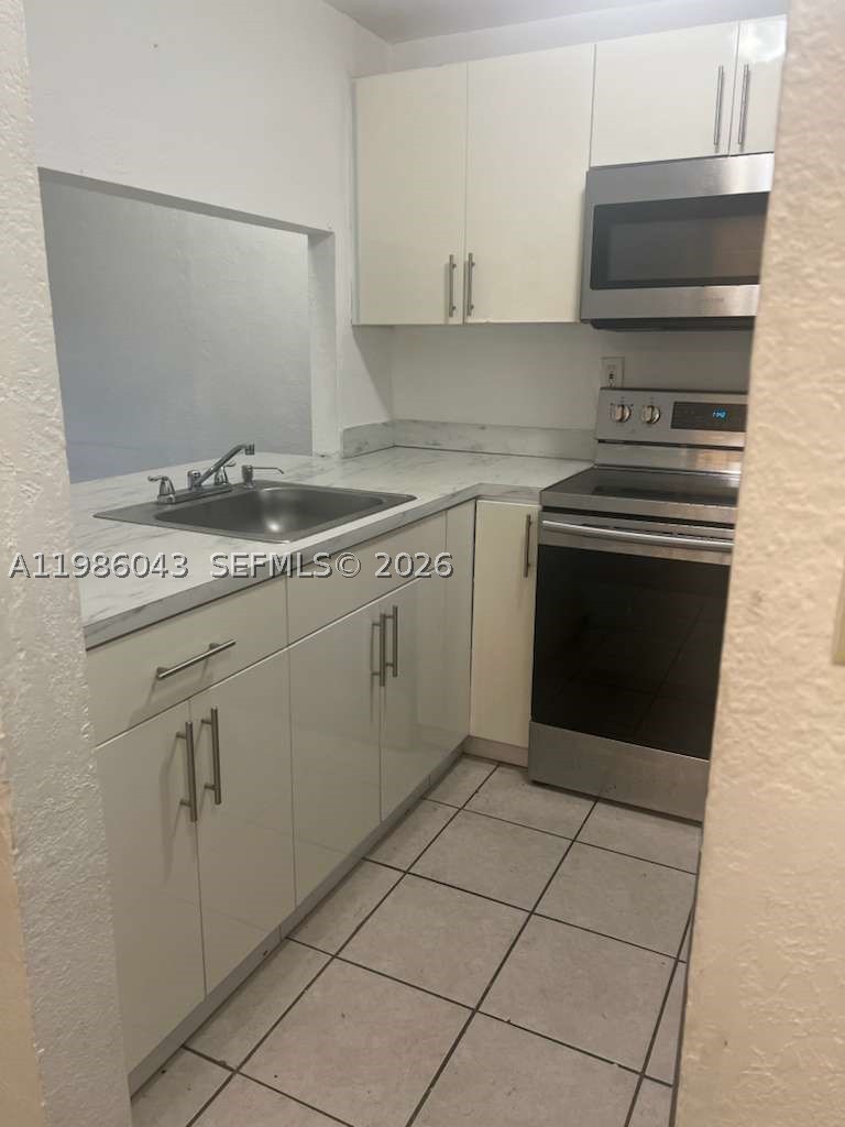 4550 Nw 9th St 114e Property Photo 2