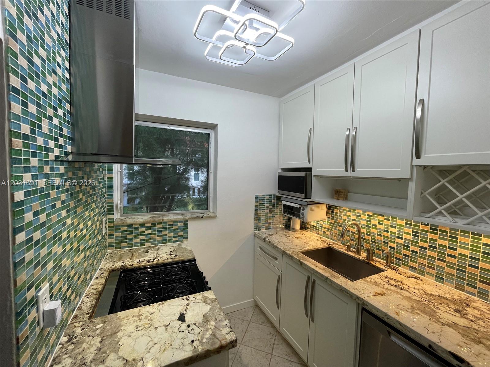 4740 Pine Tree Dr 25 Property Photo 5