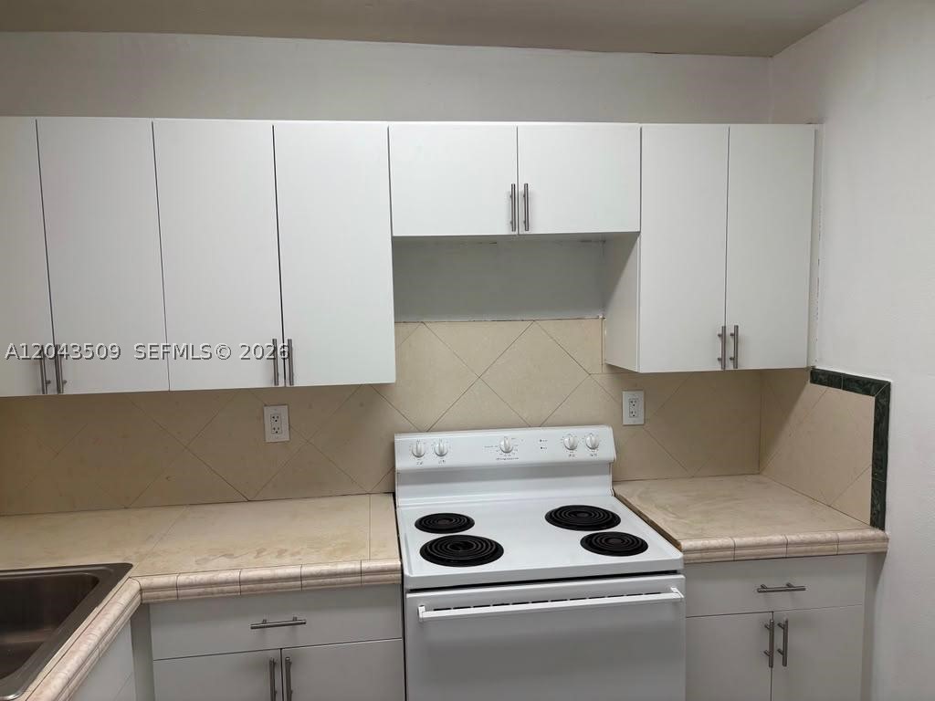 492 Nw 165th St Rd C-211 Property Photo 12