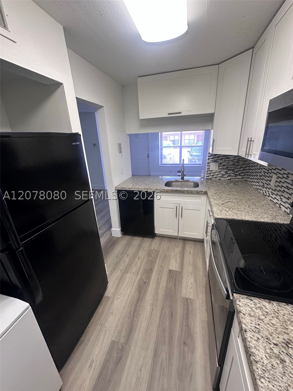 10049 Winding Lake Rd 103 Property Photo 4