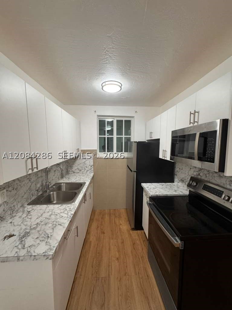 160 NE 55th St 3 Property Photo 1