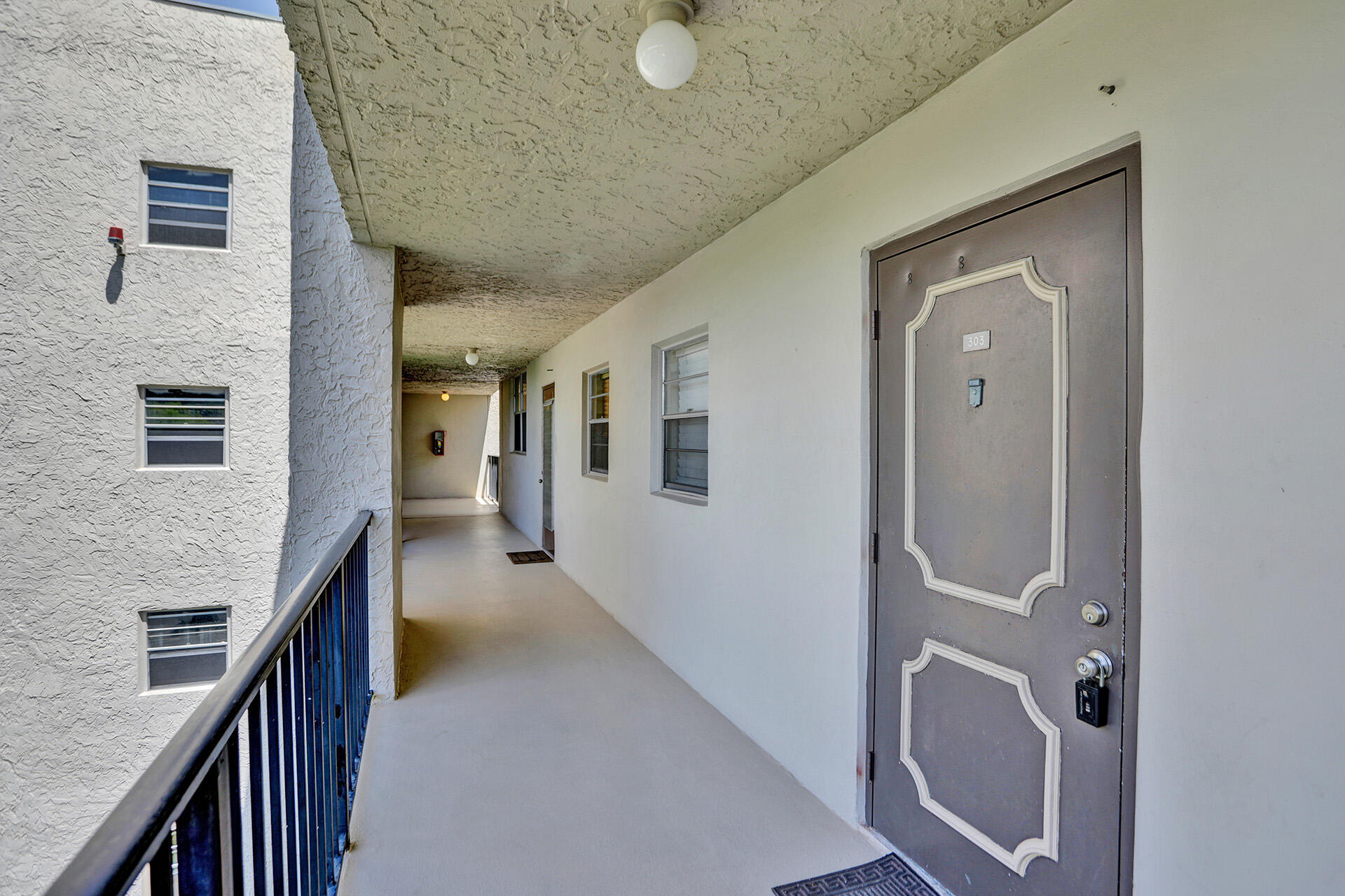 9230 Lagoon Place 110 Property Photo 2