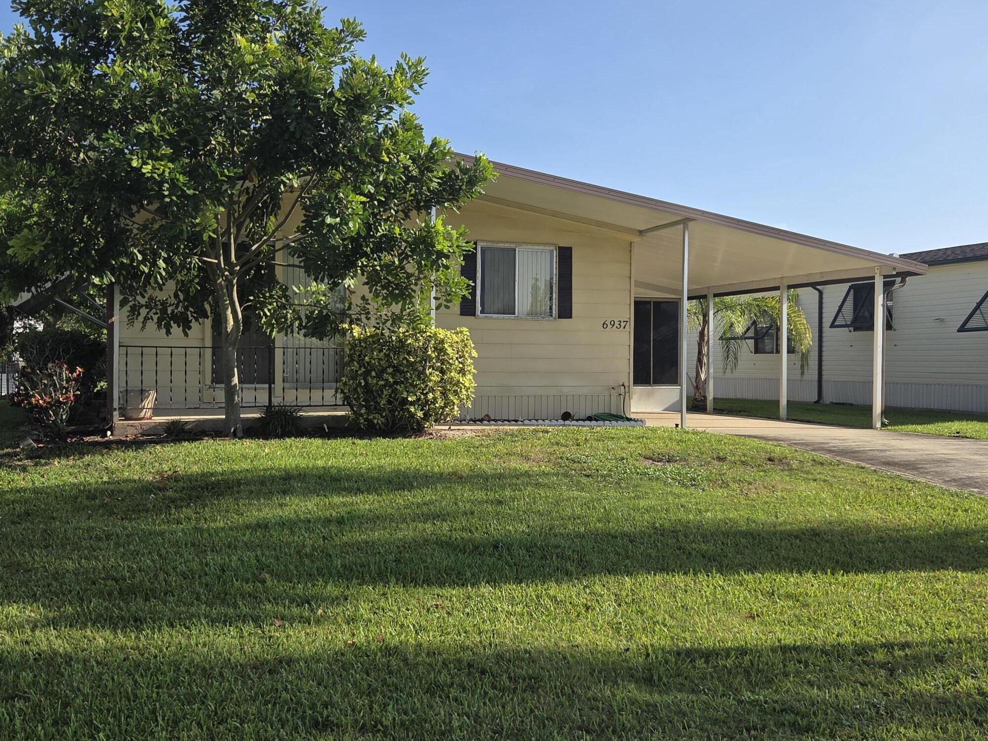 6937 Se Delegate Street Property Photo 1